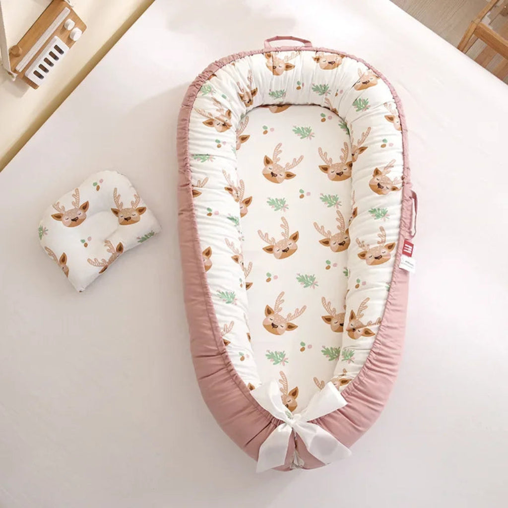tour de lit - réducteur de lit bébé  rose Motifs cerfs