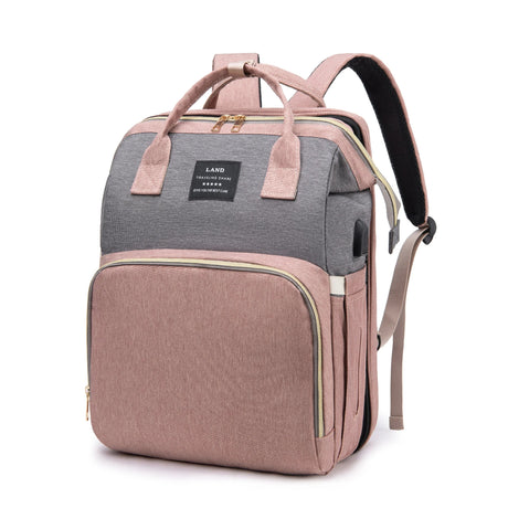 Sac a dos a langer avec lit d'appoint Rose