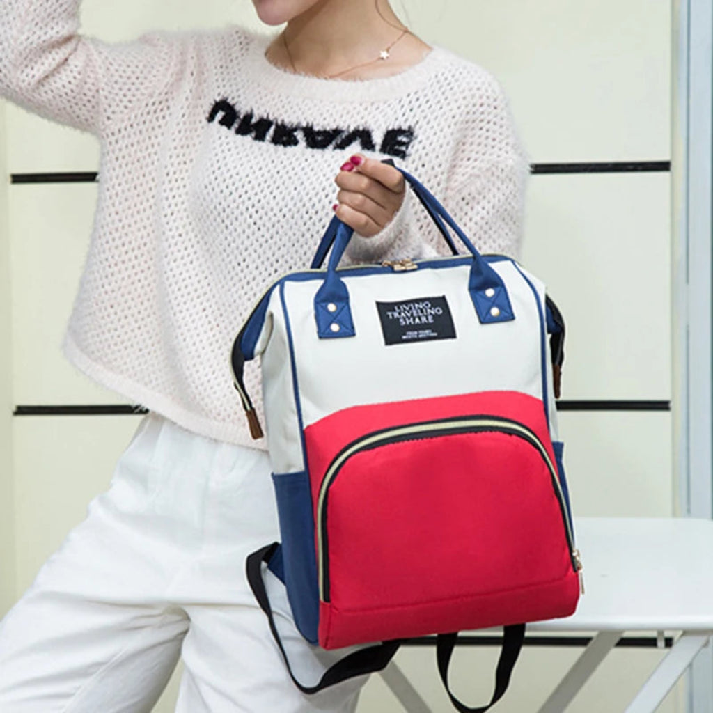 Sac à dos à langer multicouleur porté main