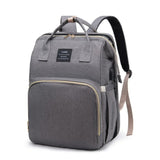 Sac à dos à langer lit nomade intégré Gris