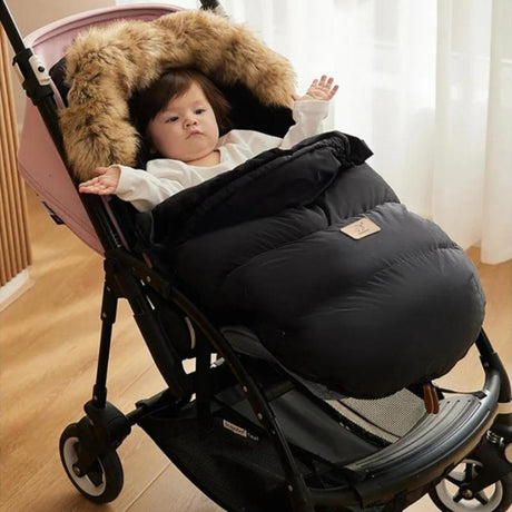 Chancelière bébé Universelle noire avec bébé mannequin
