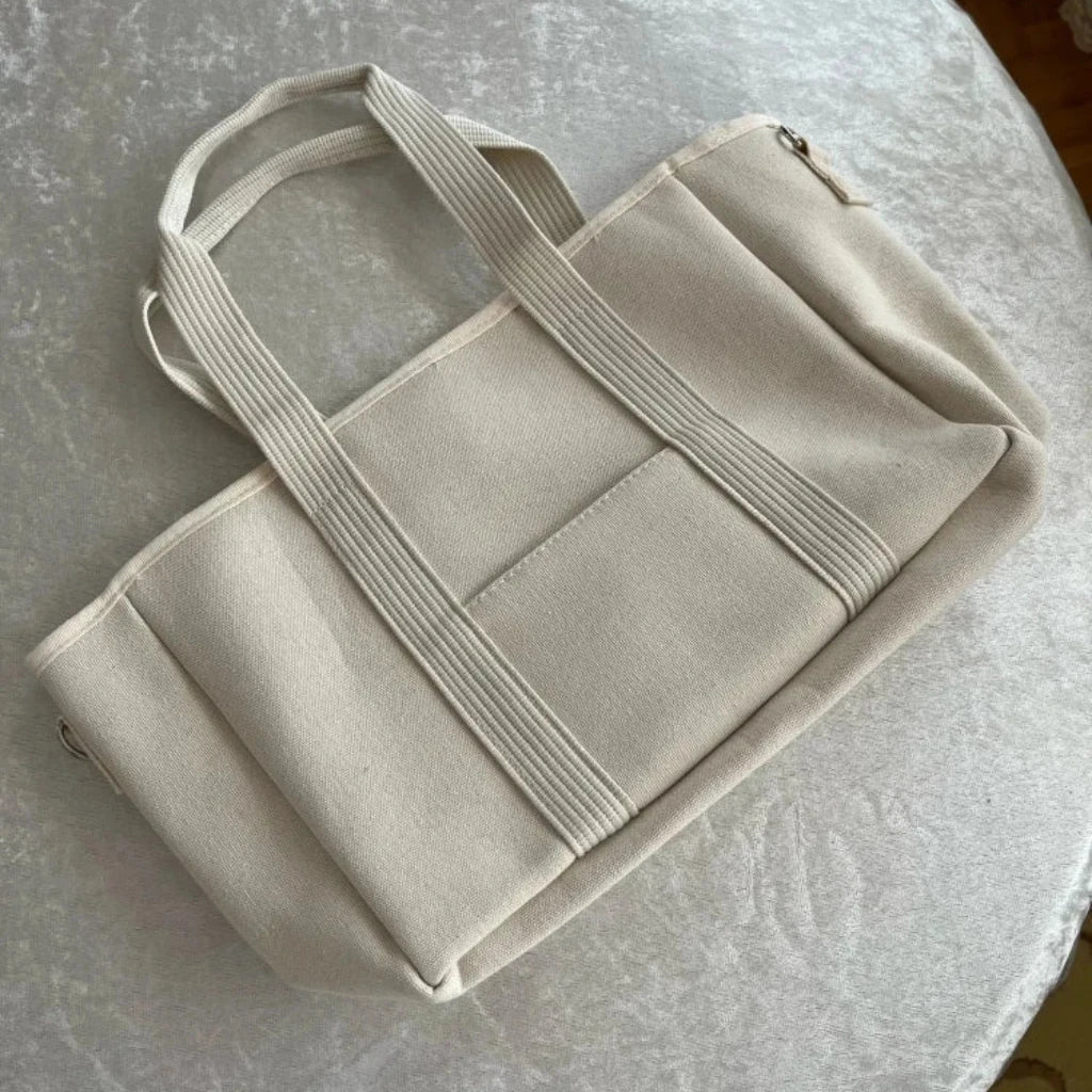 sac à langer en toile avec cordon ajustable Retourné