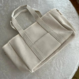 sac à langer en toile avec cordon ajustable Retourné