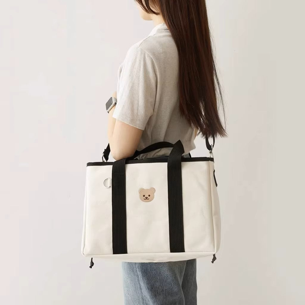 sac à langer en toile avec cordon ajustable porté épaule