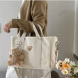 sac à langer en toile avec cordon ajustable Porté bras