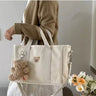 sac à langer en toile avec cordon ajustable Porté bras